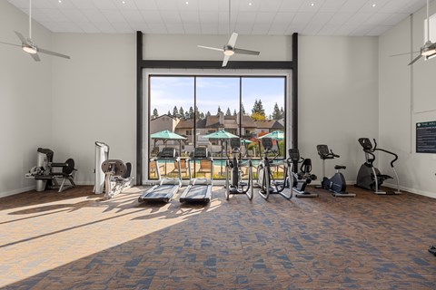 Fitness Center with large window at THE ARLO, California, 95621