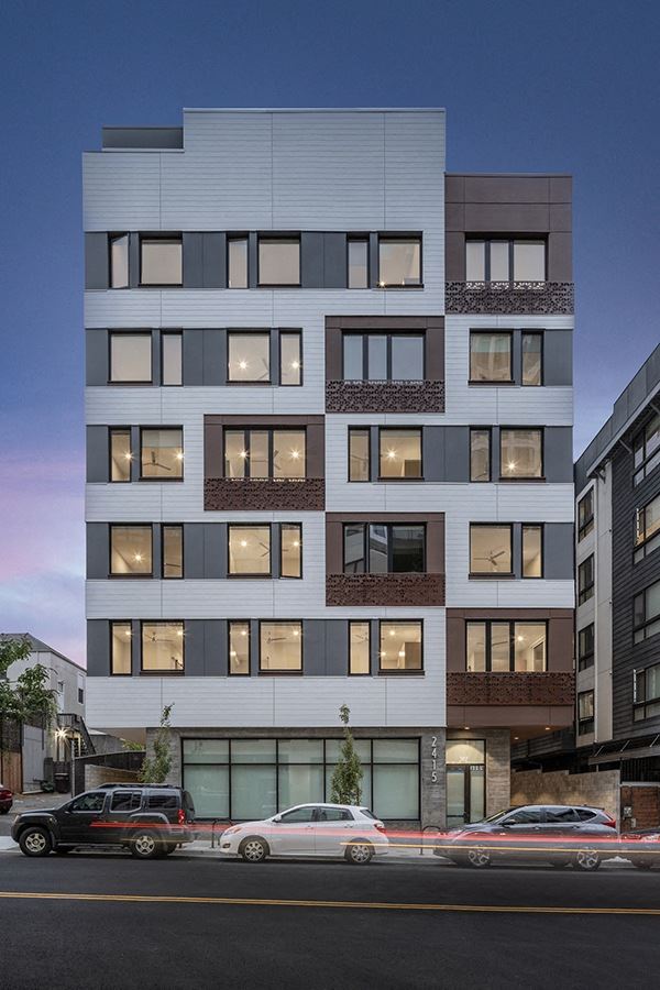 Oakland Apartments - Electric Lofts - Exterior of Building with White Paneling, Windows, and Modern Design - Photo Gallery 1