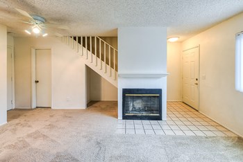 Living room with carpet and fireplace - Photo Gallery 6