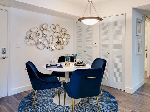 Dining area with furniture at Aqua 2800, Florida  