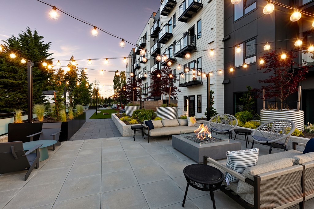 A patio with a fire pit and seating area  at Two 10 by Vintage, Shoreline, Washington