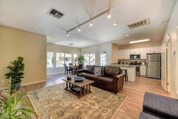 Antelope Apartments for Rent - Azure - Apartment Leasing Office with Couch and Kitchen - Photo Gallery 5