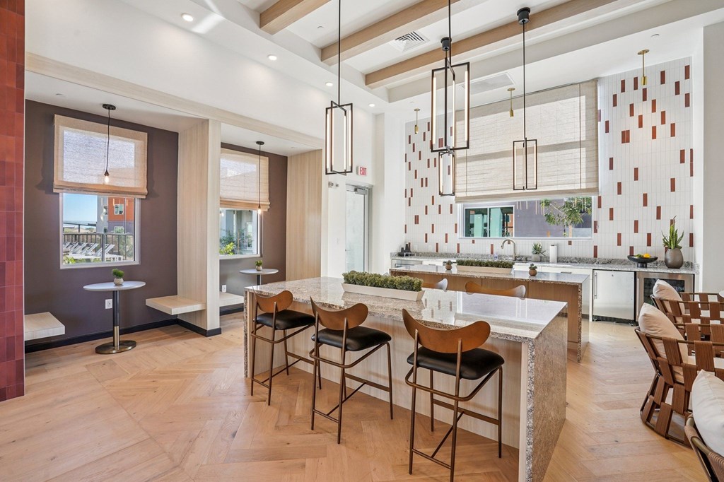 A modern kitchen with a dining table and chairs.at Cottonwood Ranch, Casa Grande, AZ 85122
