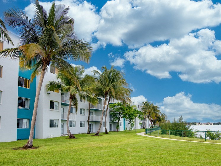 Exterior view of building near water and grass