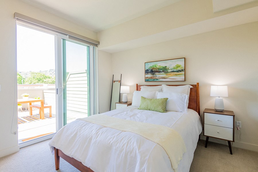 Large bedroom with over sized windows