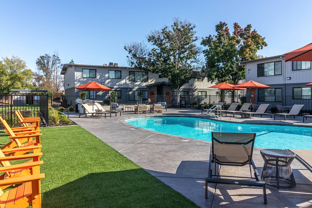 our apartments have a large pool and lounge chairs