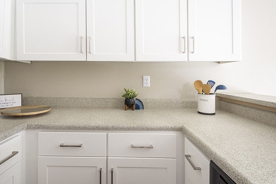 Apartments for Rent in Rohnert Park, CA - Americana - Kitchen with Spacious Countertops, White Cabinets, and Stainless-Steel Appliances