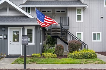 Americana leasing office entrance and future resident parking - Photo Gallery 2