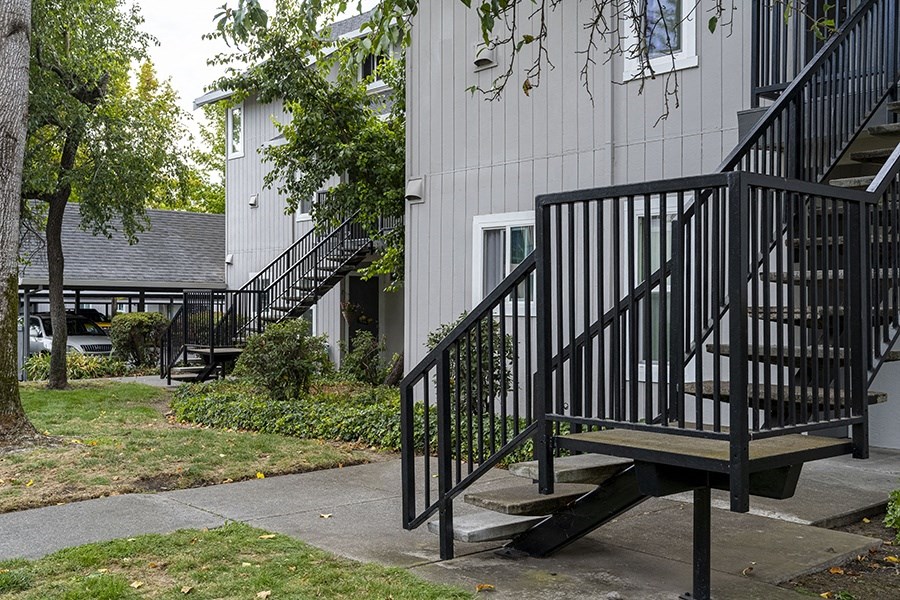 Americana building exterior and lush landscaping
