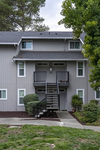 Americana building exterior with stairs to upper floor - Photo Gallery 3