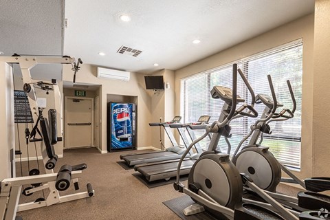 Ashford Park fitness center with cardio and weight equipment