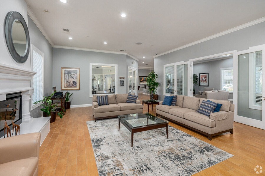 a living room with two couches and a fireplace