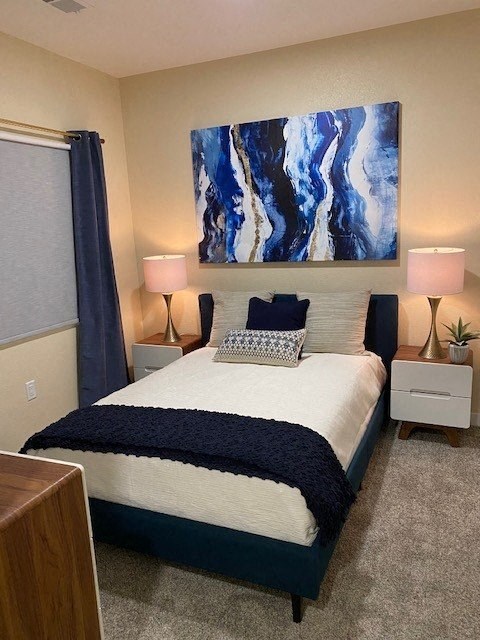 Sparks, NV Apartments - Spacious Bedrooms With Carpet Flooring And A Window.