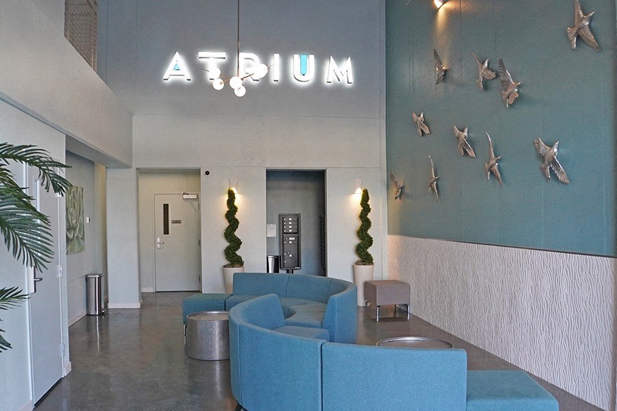 Lobby with seating near mail area
