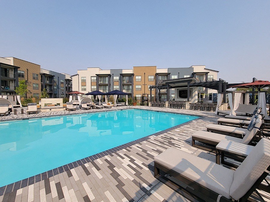 Azure Apartments in Sparks NV pool with lounge seating and umbrellas