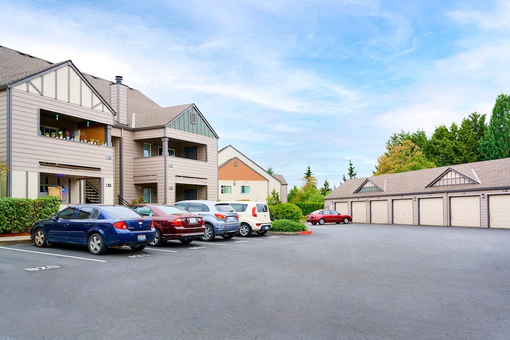 Building exteriors and lush landscaping at Devonwood and First Place Apartments, Washington