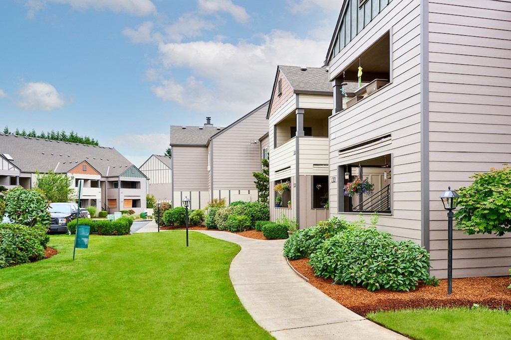 Building exteriors and lush landscaping at Devonwood and First Place Apartments, Battle Ground Washington