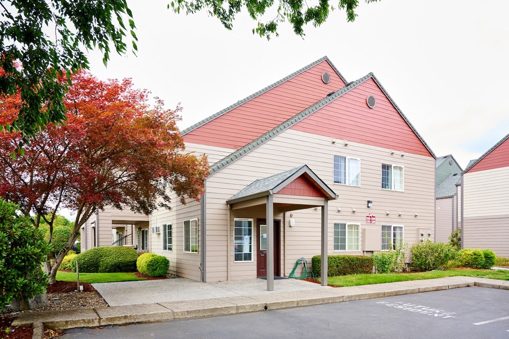 Building exteriors and lush landscaping at Devonwood and First Place Apartments, Battle Ground, WA