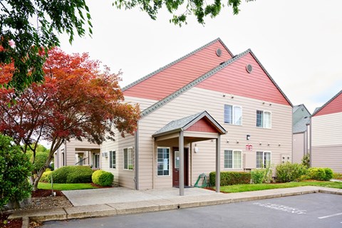 Building exteriors and lush landscaping at Devonwood and First Place Apartments, Battle Ground, WA