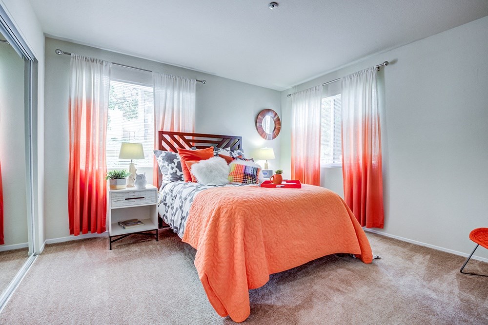 Bella Vista at Hilltop Apartments in Richmond, CA with wall to wall carpet, white walls, and large window