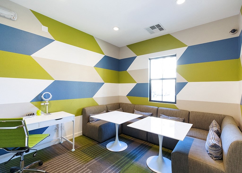 Lounge area with seating and tables at CHANDLER APARTMENT HOMES, Las Vegas, 89139