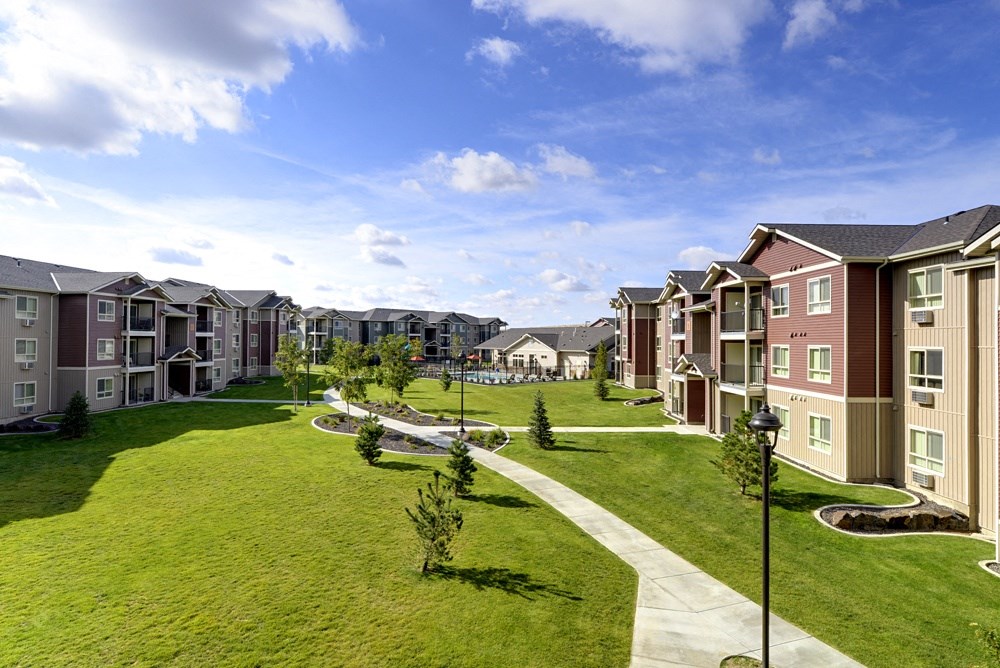 Lush landscaping and walking paths throughout community