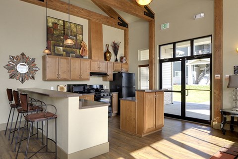 a kitchen with a counter top and a refrigerator