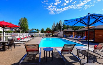 Clock Tower Village pool with lounge chairs - Photo Gallery 6