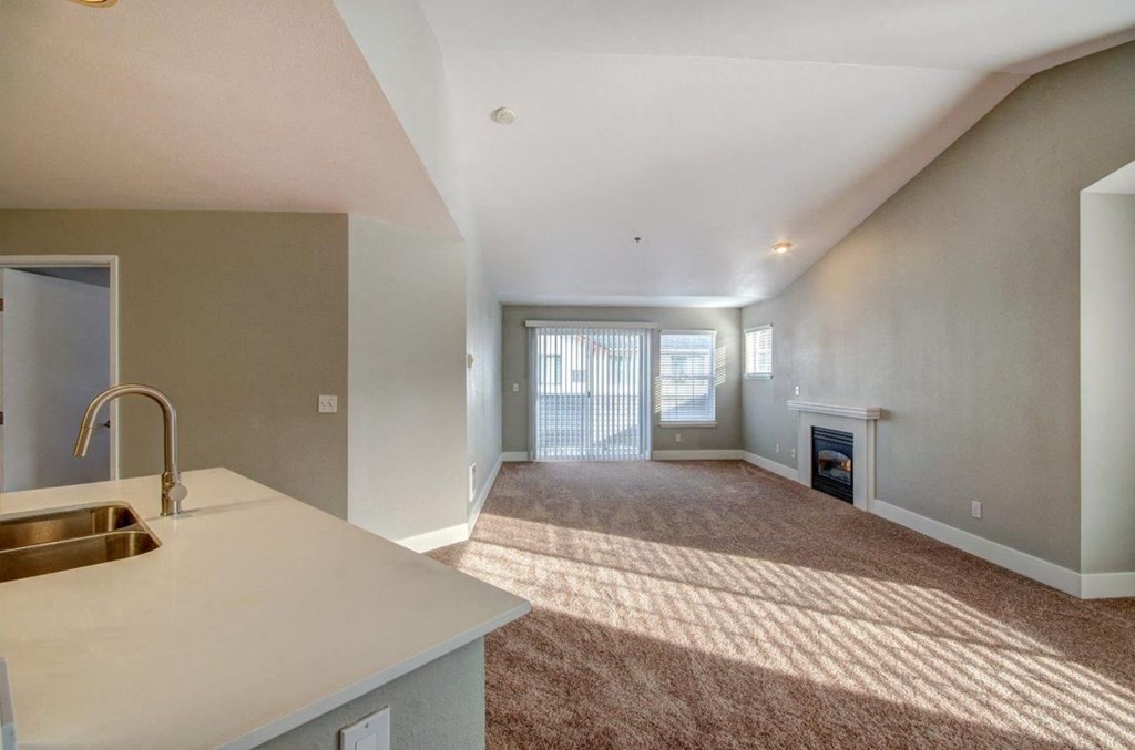 Clock Tower Village living area with carpeting