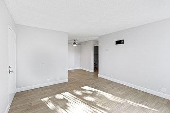 Doriana Apartments in San Diego view of living area and dining space - Photo Gallery 5