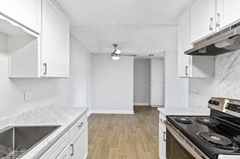 Doriana Apartments in San Diego full kitchen with stainless steel appliances - Photo Gallery 4