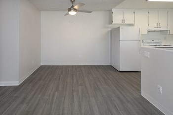 Dining area near kitchen with wood floors - Photo Gallery 5