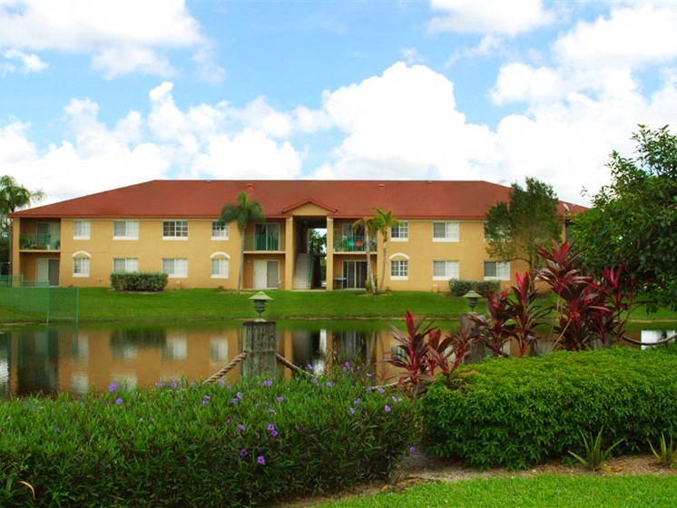 Lake with grass and trees at Cross Keys, North Lauderdale, Florida