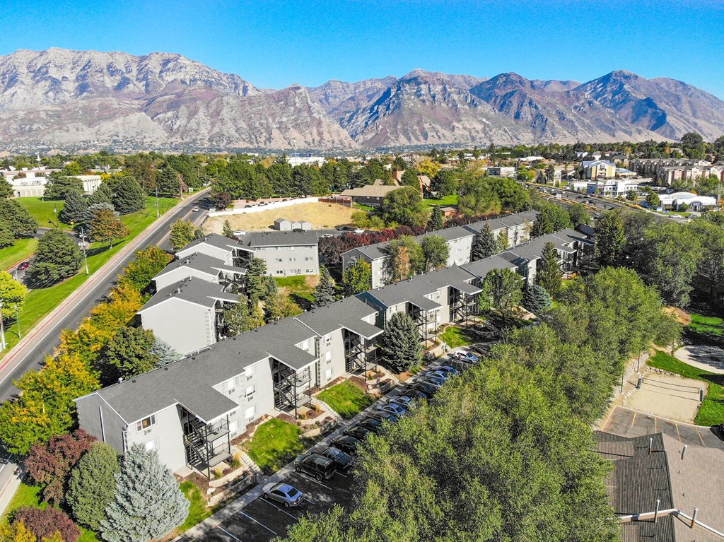an aerial view of apartments with mountains in the background at Mountain Run Apartments, UT, 84058