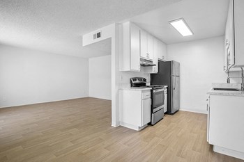 Wood floors in living room near dining area - Photo Gallery 5