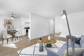 Furnished living room and dining with wood floors near kitchen - Photo Gallery 6