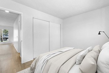 Furnished bedroom with wood floors and Closet - Photo Gallery 5