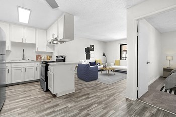 Wood floors in kitchen and living room near hallway - Photo Gallery 2