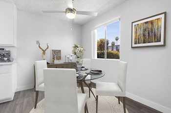Dining area with wood floors near window - Photo Gallery 2