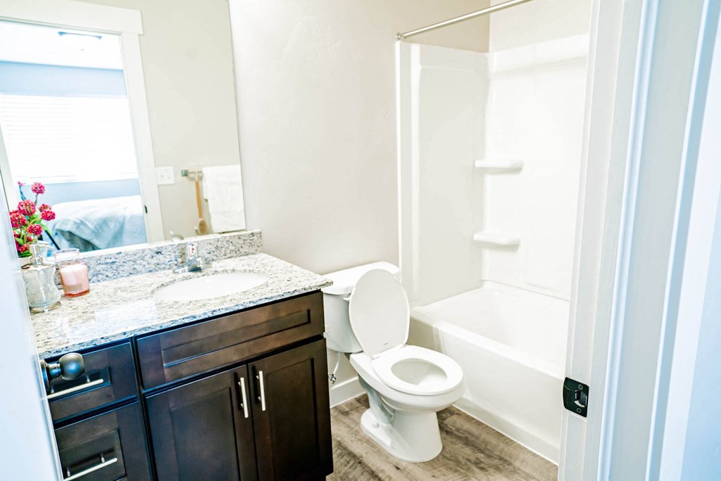 a bathroom with a toilet and a sink at Arcadia Townhomes, Utah, 84067
