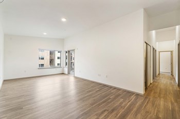 Crescent Point living area with plank flooring - Photo Gallery 6