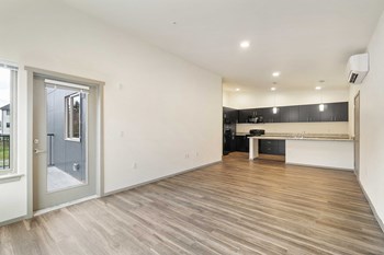 Crescent Point living area with plank flooring - Photo Gallery 7