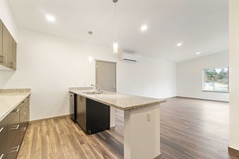 Crescent Point kitchen with plank flooring and dark cabinetry - Photo Gallery 4