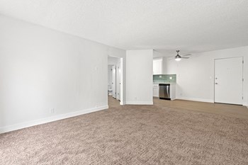 Living room and kitchen Nimitz Pointe Apartments - Photo Gallery 4