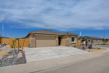 a house with a garage in front of it