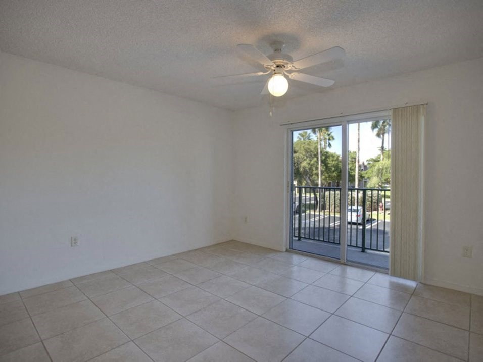 Living room with patio door Doral Terrace in Doral Florida