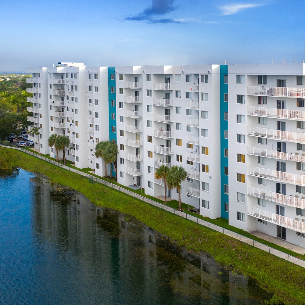 Exterior of building near water  Aqua 2800 Apartments in Oakland Park Florida