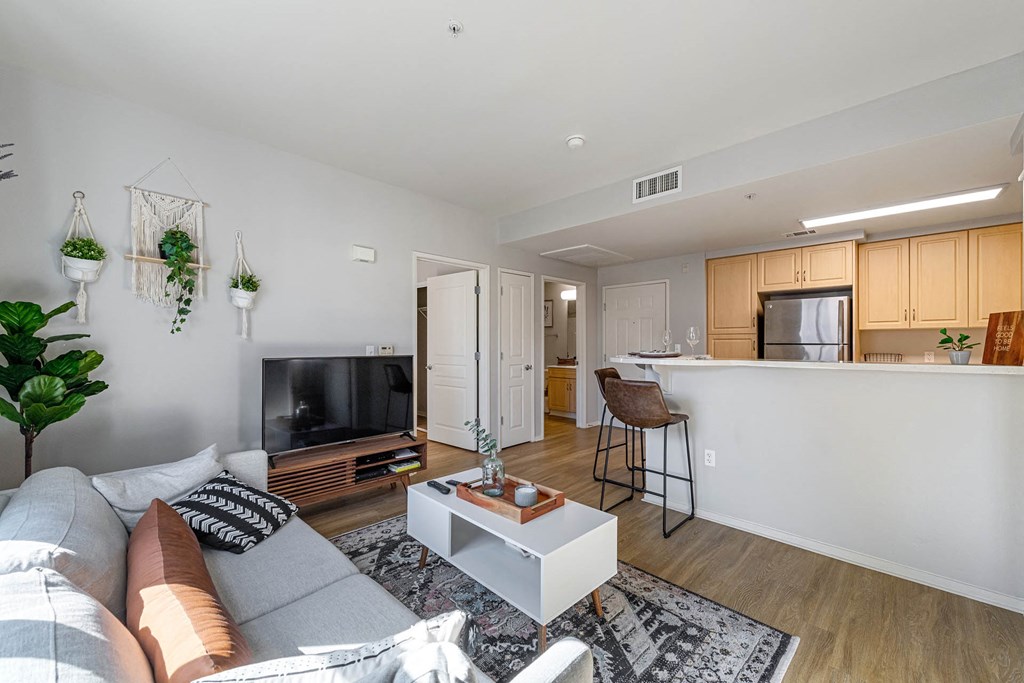 a living room with a couch and a coffee table at K Street Flats, Berkeley California