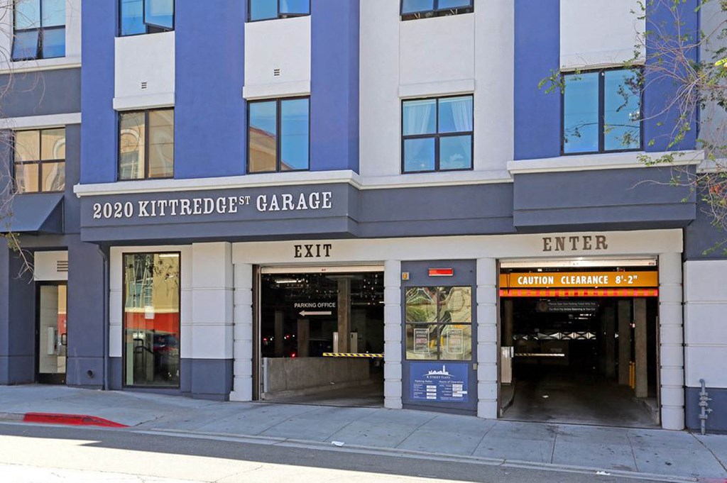 a building with a blue and white facade and a street in front of it at K Street Flats, Berkeley, CA