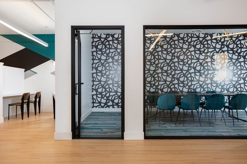 a room filled with furniture and a large window at K Street Flats, Berkeley, 94704